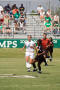 Primary view of [Katy Booth chasing the soccer ball]