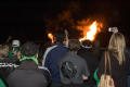 Photograph: [Students taking pictures of Homecoming Bonfire, 2007]