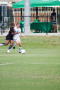 Photograph: [Danielle Herron fighting for soccer ball]