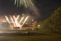 Photograph: [Firework fountains and bursts at lake]