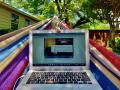 Photograph: [Alexis Fritz-Stibbe working from home in a hammock]