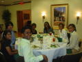Photograph: [Students at a table during the 2007 WOC Conference]