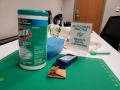 Photograph: [Disinfecting wipes and social distancing signage at Willis Library]