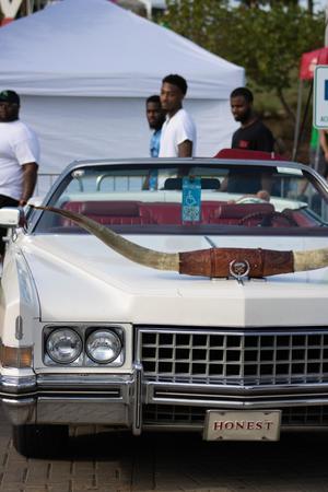 Primary view of object titled '[1973 Cadillac Eldorado convertible with the Honest plate]'.