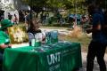Thumbnail image of item number 1 in: '[Meagan May and Jodi Doty-Rhinehart at the UNT Special Collections table]'.