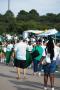 Photograph: [Tailgaters watching UNT cheer team]