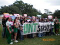 Photograph: [People gathered with a UNT SERVES sign 2]