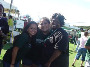 Primary view of object titled '[Alumni and students at 2004 UNT Homecoming tailgate]'.