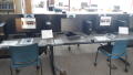 Primary view of [Public computer workstations at East Arlington Public Library with social distancing signage]