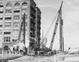 Photograph: [Photograph of construction of a building labeled "Southern Pacific"]