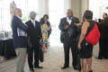 Photograph: [People mingling in hallway at 2012 TABPHE conference]