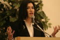 Photograph: [Young woman speaking at 2004 La Raza event 7]