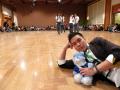 Photograph: [Man on floor at APAEC 2012]