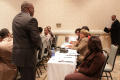 Photograph: [Women speaking to Dr. Hill at 2012 TABPHE conference workshop]