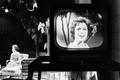 Photograph: [A woman on a television screen, 2]