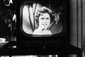 Photograph: [A woman on a television screen, 4]