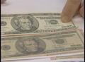 Video: [News Clip: Counterfeit twenty-dollar bills]