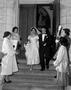 Photograph: [Bride and groom making their exit]