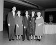 Photograph: [Group of three women and two men in formal attire]