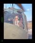 Thumbnail image of item number 1 in: '[Iranian officials sitting in a Huey helicopter]'.