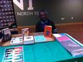 Photograph: [Multicultural Center display at 2013 Emancipation Proclamation event]