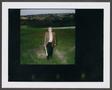 Primary view of [Man standing in a field]