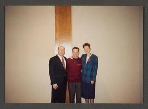 Primary view of object titled '[Three smiling people]'.