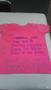 Photograph: [Message on pink Clothesline Project t-shirt]