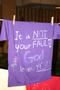 Photograph: [Message on purple Clothesline Project t-shirt]
