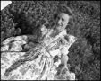 Primary view of [Avesta Favorite Edna Jo Allen Posing in a Field #1, 1944]