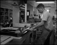 Primary view of [Book Bindery - Process #2 - Male Individual - 1963]
