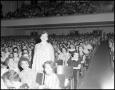 Primary view of [Shirley Boone standing in an audience]