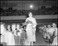 Primary view of [Shirley Boone holding a bouquet]
