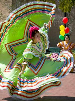 Primary view of object titled '[Folklorico dancer in green at 2008 Carnaval, 4]'.