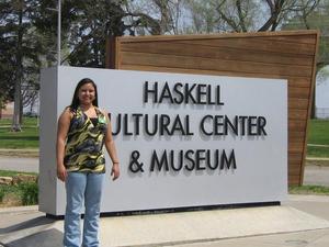 Primary view of object titled '[Woman at Haskell Cultural Center & Museum]'.