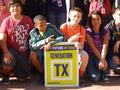 Photograph: [Students holding Generacion TX sign]