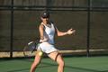 Photograph: [Narine Kazarova hits ball during tennis match]