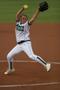 Photograph: [Ashley Lail pitches at UNT softball game, 3]