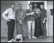 Photograph: [Photograph of five men and cat]