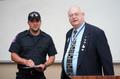 Photograph: [John Anderson and EMT at first responders ceremony]