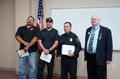 Photograph: [John Anderson with first responders at awards ceremony]