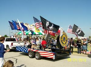 Primary view of object titled '[Granbury Lions Club float at Welcome Home Veterans parade]'.
