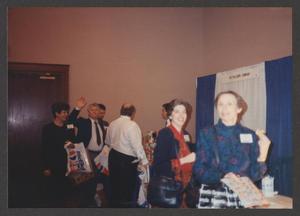 Primary view of object titled '[People visiting booths at a conference]'.