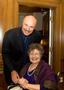 Photograph: [Dr. Phil with woman at inauguration reception]