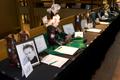 Photograph: [Auction table at 2008 Emerald Ball]