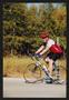 Photograph: [Cyclist #99 speeds by: Lone Star Ride 2002 event photo]