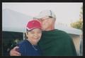 Photograph: [Older couple embracing and kissing: Lone Star Ride 2003 event photo]