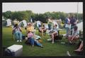 Primary view of [Lawn chair group surrounded by tents: Lone Star Ride 2004 event photo]