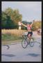 Photograph: [Cyclist pulling into last stop of day one: Lone Star Ride 2004 event…