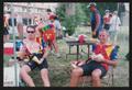 Photograph: [Cyclists sitting eating lunch: Lone Star Ride 2004 event photo]